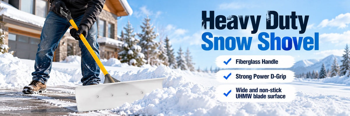 Heavy duty snow shovel in use clearing snow from a residential driveway in Calgary, Alberta, ideal for winter snow removal.