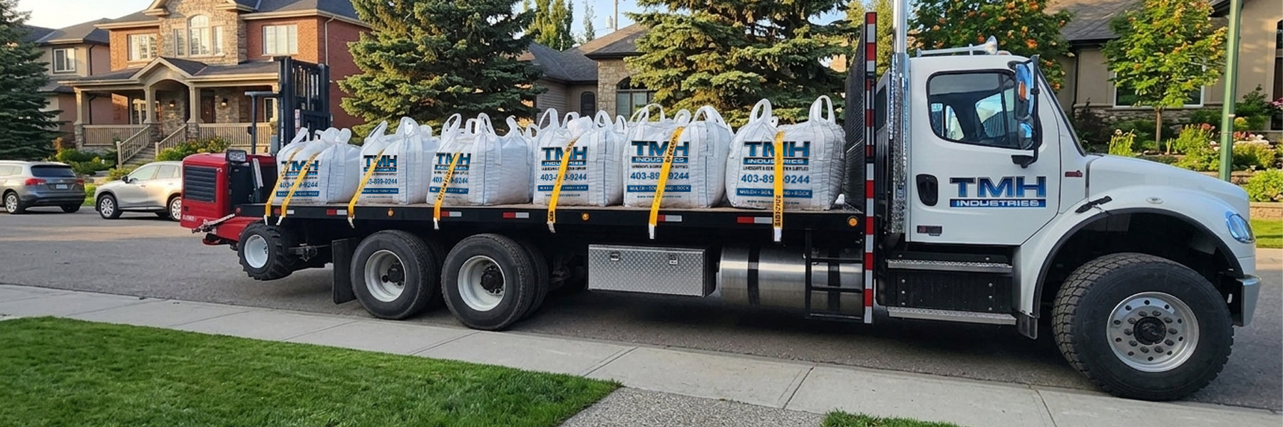 TMH Industries landscape supply delivery Calgary bulk bags gravel sand decorative rock