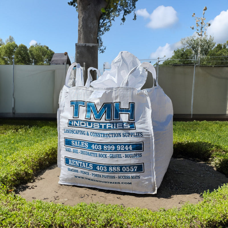 1-yard bulk bag decorative rock from TMH Industries Calgary, clean and convenient for landscaping projects with quick delivery or easy pickup.