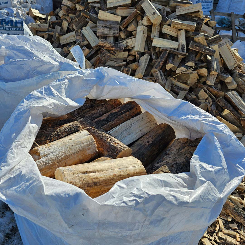 Firewood in bulk bags available in Calgary, featuring birch and pine firewood for clean burning, easy handling, and convenient pickup or delivery.
