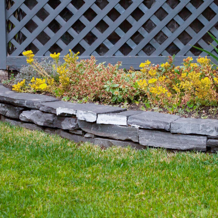 Flat 1-3" Rundle Ledgestone stacked in landscape border
