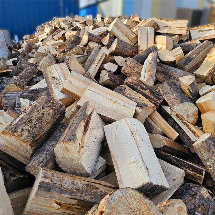 High-quality pine firewood supply in Calgary, ideal for residential and commercial use, ready for pickup or delivery.