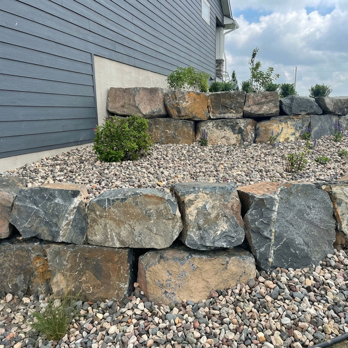 BC Stackable Boulders used for natural landscape retaining walls and garden rock features in Calgary