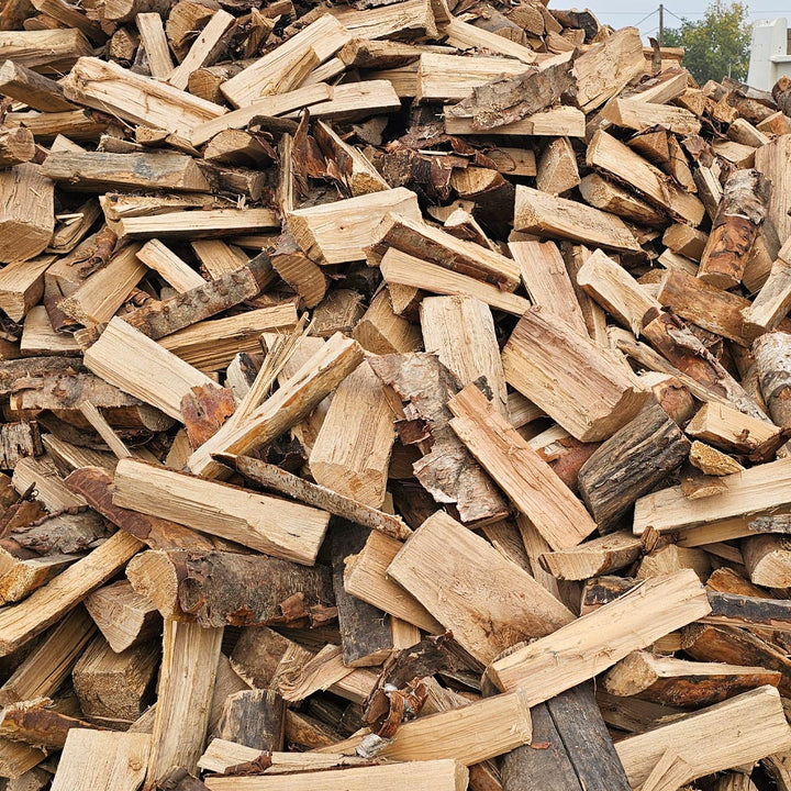 Quarter bag of birch firewood, high quality dry burning wood perfect for indoor fireplaces, outdoor fire pits, and camping use in Calgary.