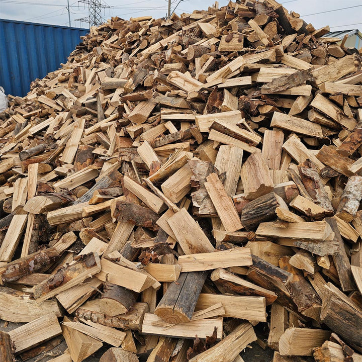 Birch firewood available in bulk, bags, and small bundles, perfect for home heating, firepits, and camping, with pick up and delivery options in Calgary.