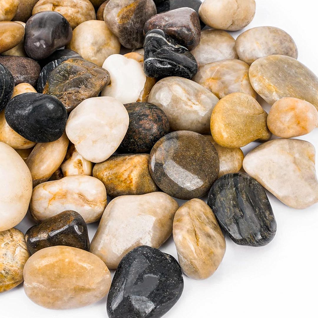 Polished pebbles available at TMH Industries, your Calgary landscape supply store. Ideal for landscaping projects, gardens, walkways, and decorative features.