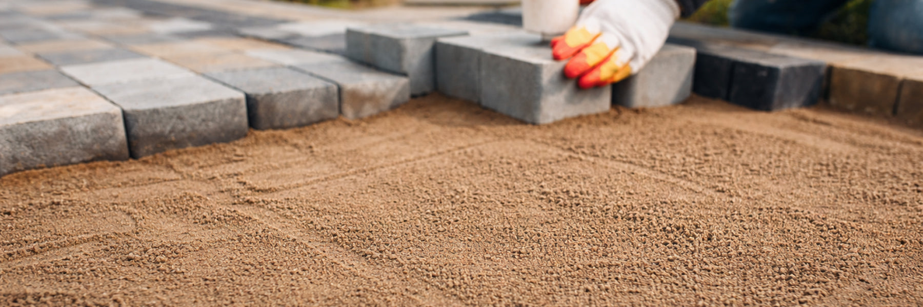 landscaping sand for base and bedding Calgary patio and walkway