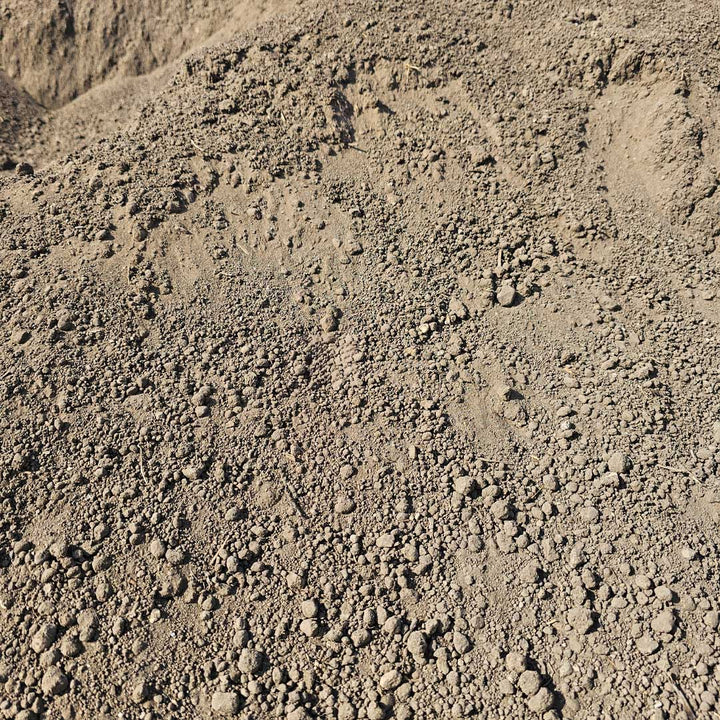 Bulk screened loam topsoil delivered in Calgary – perfect for lawn repair, planting, and landscaping projects