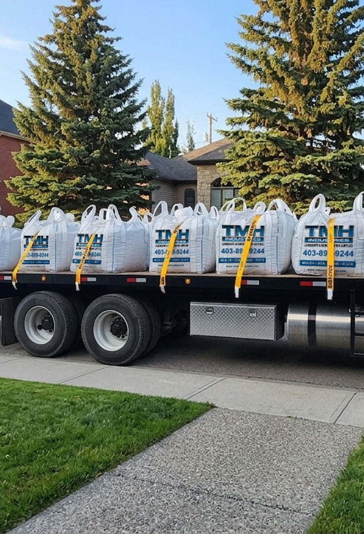 Bulk landscape bags delivery Calgary and surrounding areas TMH Industries flat deck truck
